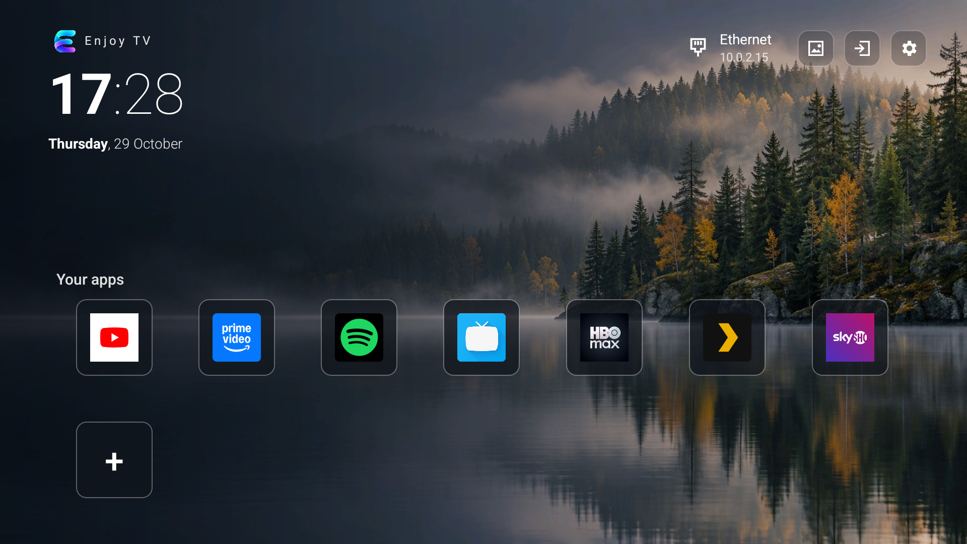 Enjoy TV home screen with apps, clock and forest background